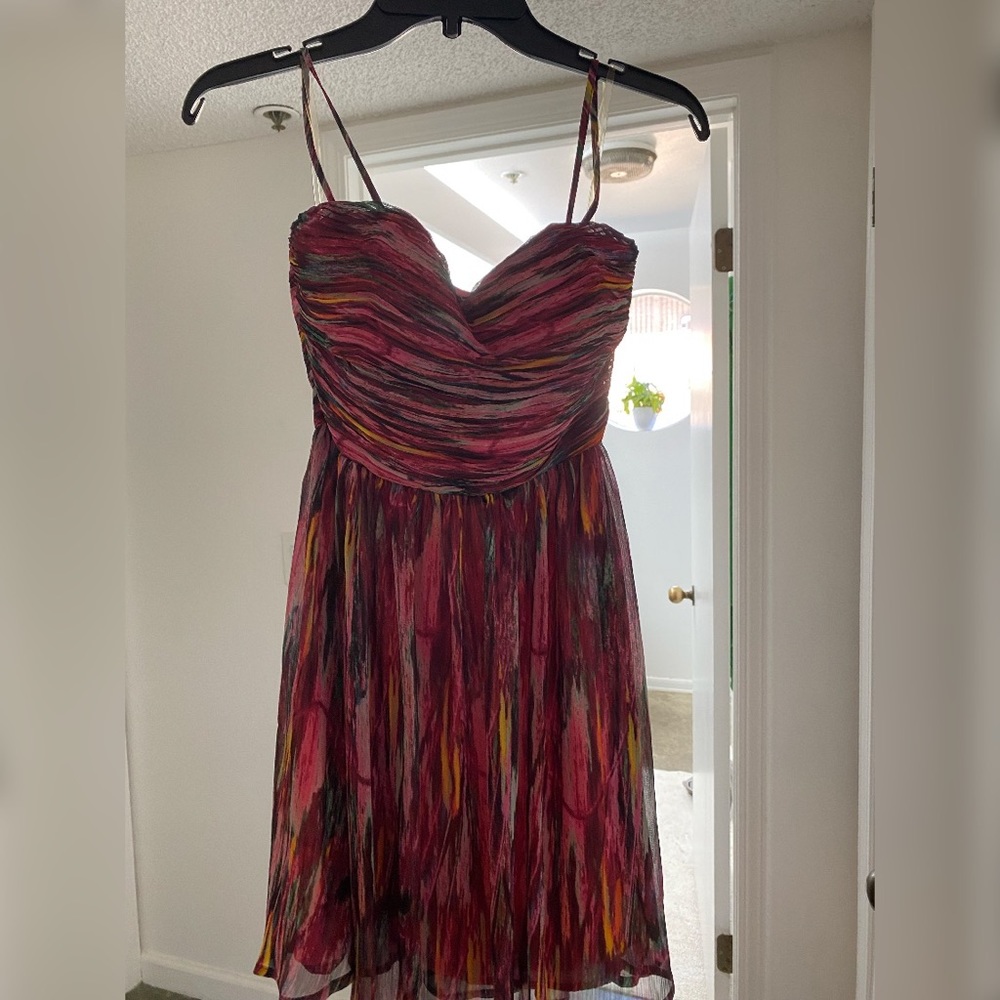 Cocktail dress. Has detachable straps.